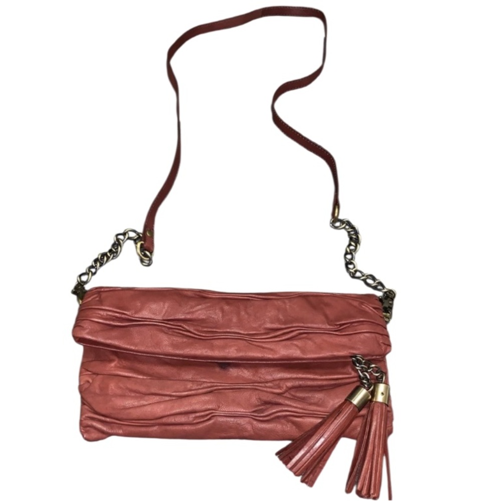 Avant Premiere Rust Colored Magnetic Roll Down Crossbody Bag W/Zip Tassel detail